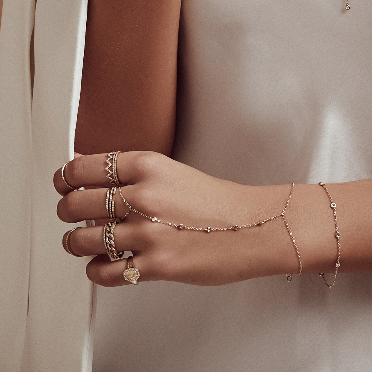 Gold Multiple Bezel Diamond Hand Chain